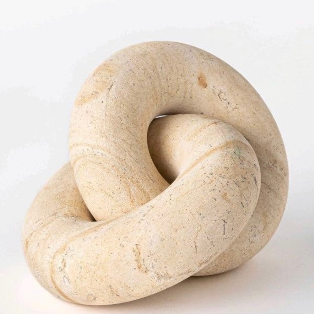 Studio McGee limestone knot. Sold out. Perfect condition